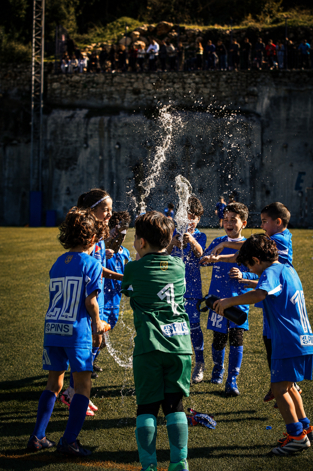 Players celebrating with a water splash
